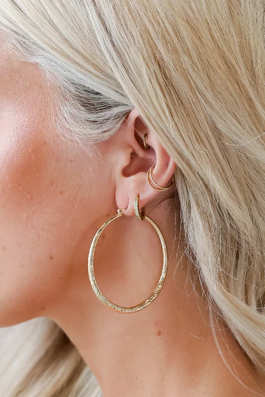 Trendy And Classic Jewelry Now At Reduced Prices Oakley Gold Textured Hoop Earrings