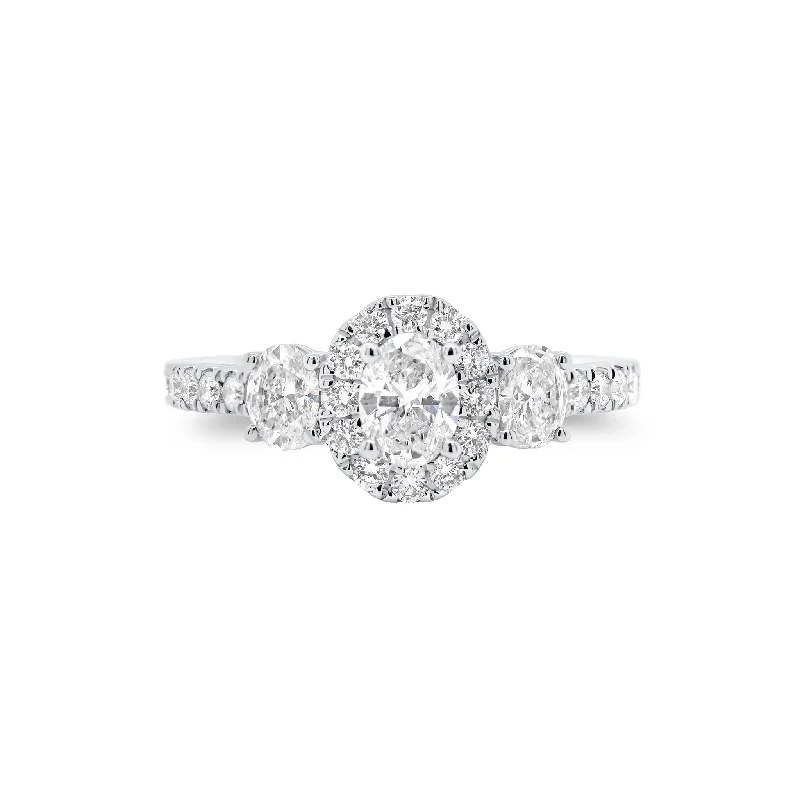 Luxury Jewelry Without The Luxury Price Tag Oval Diamond Halo Three-Stone Engagement Ring