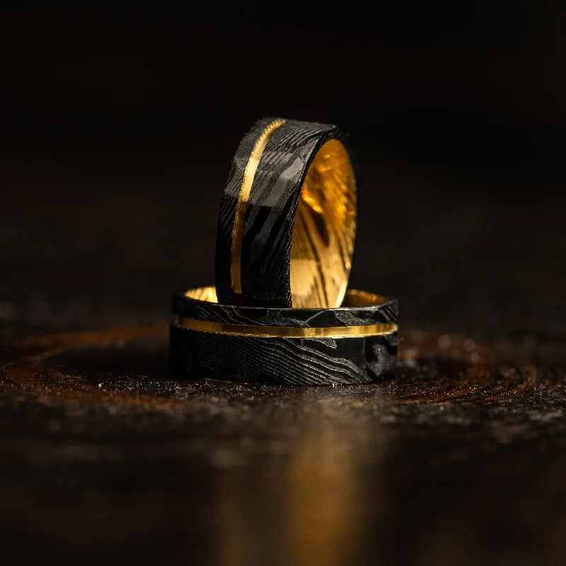 Discounted Jewelry For A Glamorous Look Black Hammered Flat "Poseidon" Yellow Gold Steel Ring