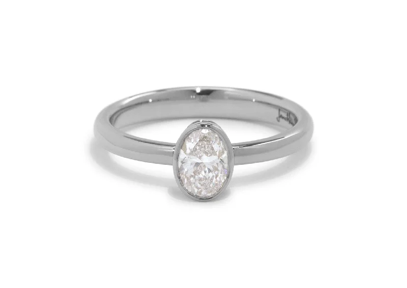 Save On Luxury Jewelry Pieces – Limited-Time Offers Oval Diamond Bezel Engagement Ring, White Gold & Platinum