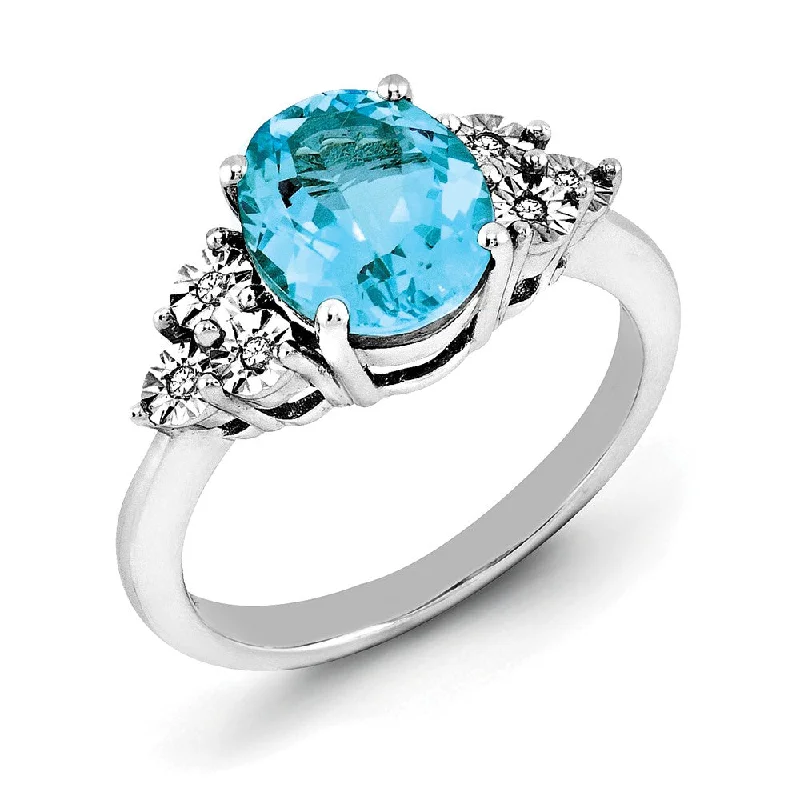 Oval Light Blue Topaz & .03 Ctw Diamond Ring in Sterling Silver