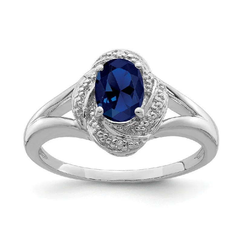 Celebrate Every Occasion With Sparkling Savings Sterling Silver .01 Ctw Diamond & Oval Created Sapphire Ring