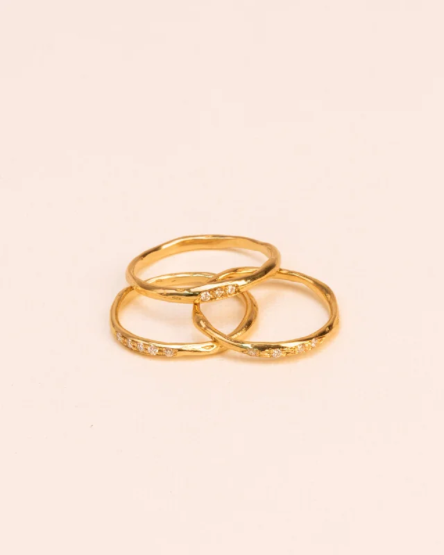 Bohemian-Inspired Jewelry For Free-Spirited Fashion Set of three stacked organic 18K Gold Rings w. Diamonds