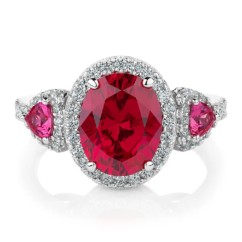 Timeless Elegance Now At Special Discounts Dress ring with ruby simulants and 0.48 carats* of diamond simulants in sterling silver