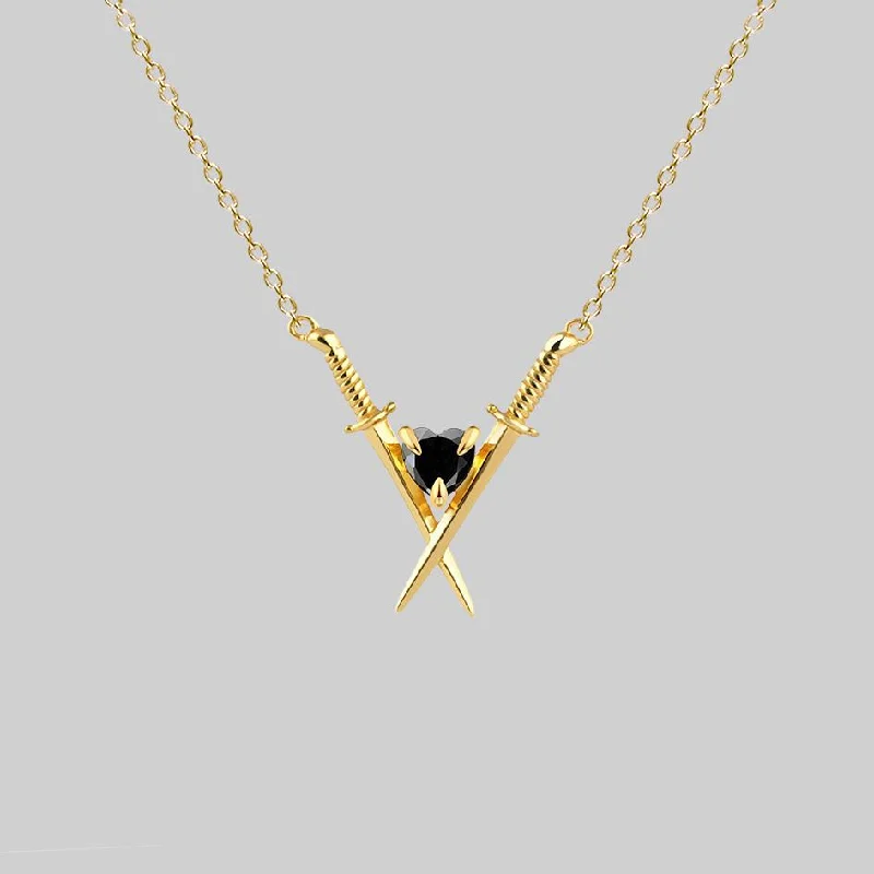 High-End Sparkle, Low-End Prices – Shop Now ABJURE. Crossed Swords & Onyx Heart Necklace - Gold