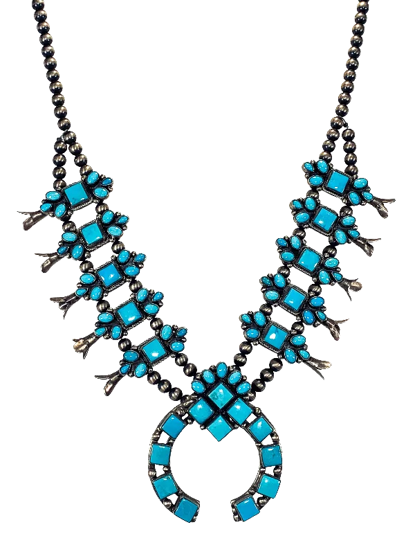 Bohemian-Inspired Jewelry For Free-Spirited Fashion Sleeping Beauty Turquoise Squash Blossom Necklace | Eddison Largo