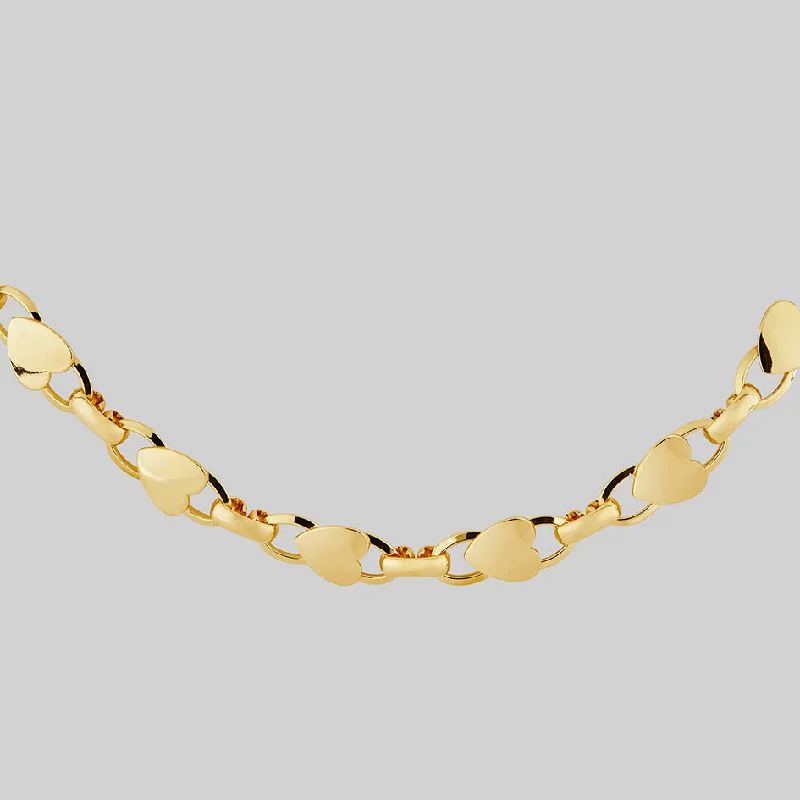 Make Your Outfit Shine With Discounted Jewelry LOVE HURTS. Heart Chain Collar - Gold