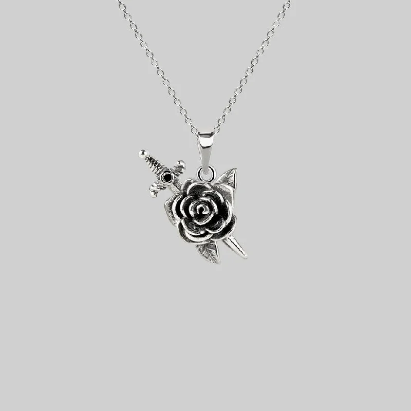 Shine Bright With Our Special Jewelry Promotions RHAPSODY. Dagger Through Rose Necklace - Silver