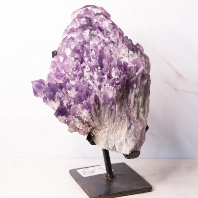 Bestselling Jewelry At Special Promotional Rates Raw Amethyst on Metal Stand